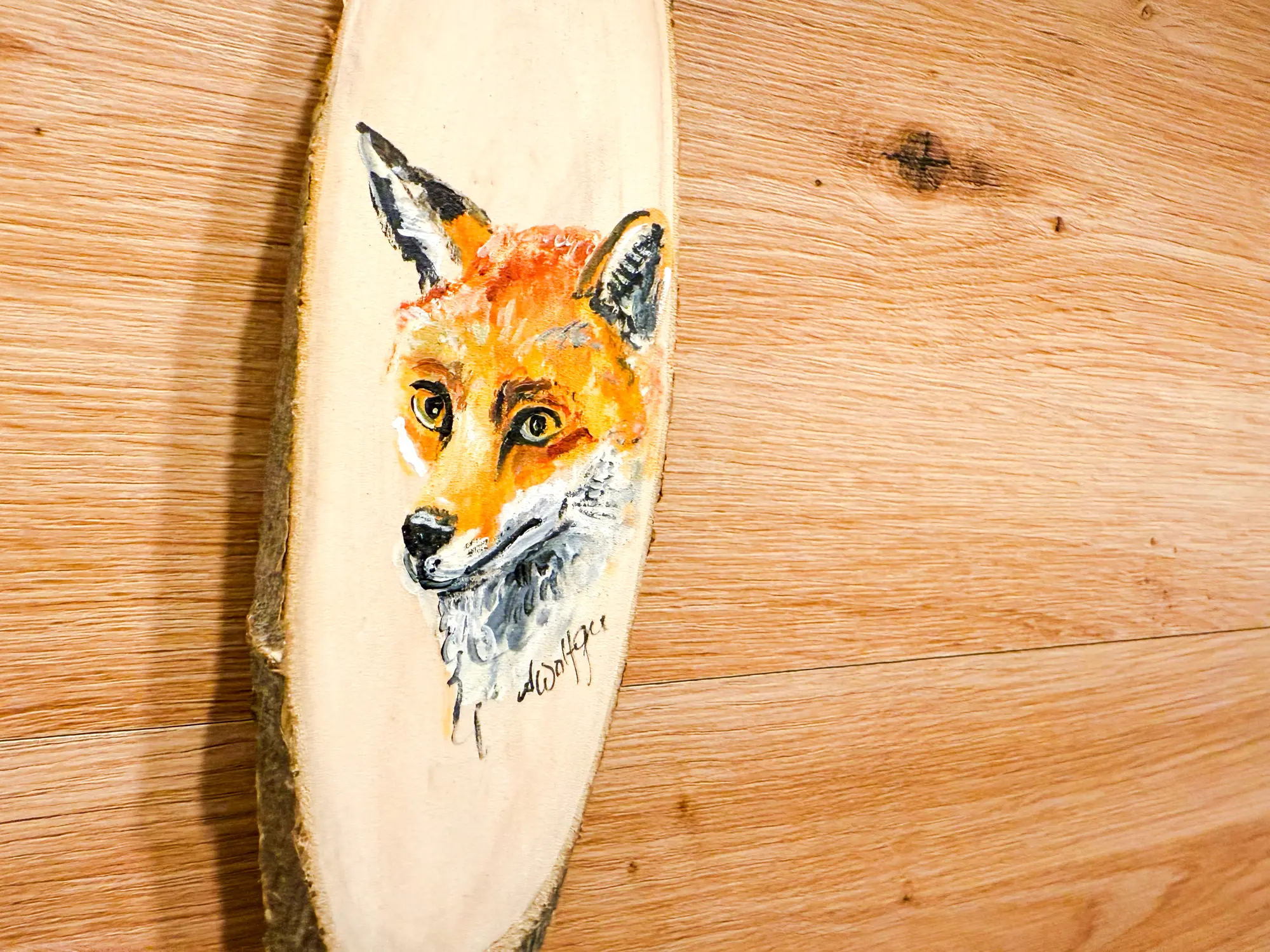 Handgeschilderde vos op hout, de naamgever van het appartement